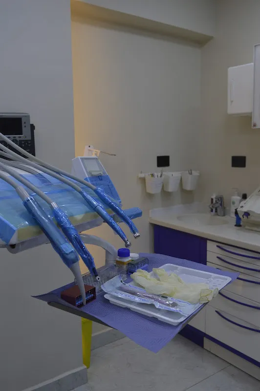 د. أحمد فتحي النص لطب وتجميل وزراعة الأسنان