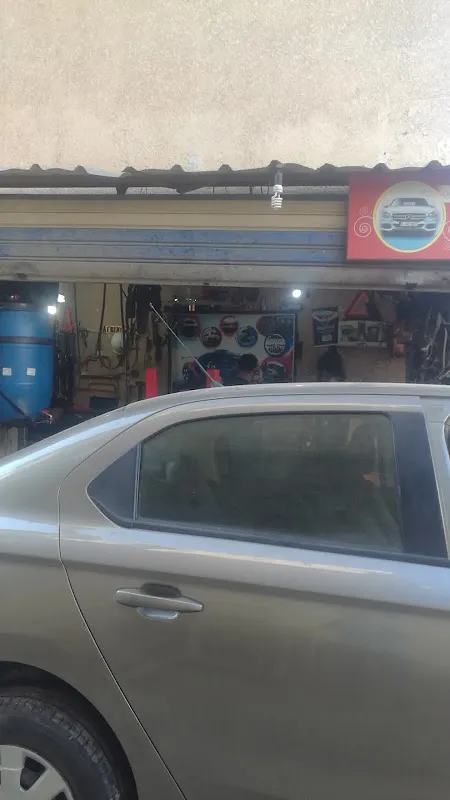 سامح الخميسي لخدمة وصيانة السيارات بالكمبيوتر ميكانيكي سيارات